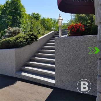 Coated outdoor stairs alt="Outdoor stairs with textured grey coating."