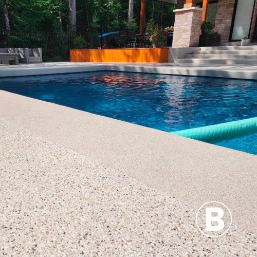 alt="pool surround covered by polyaspartic surface"