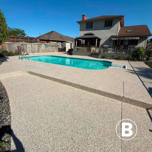 alt="pool surround covered by polyaspartic surface"