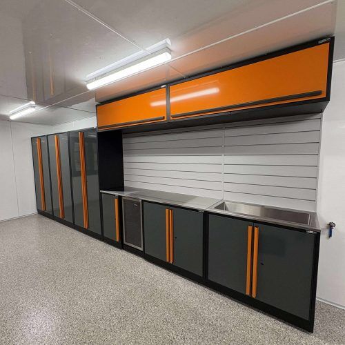 alt="beautiful garage with durable polyaspartic floor and big sotrage solutions by B.Protek"