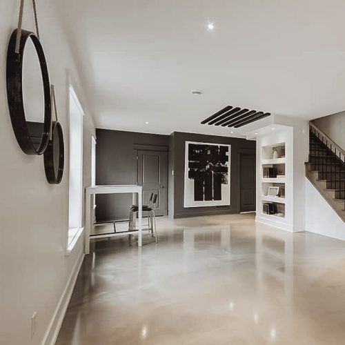 alt="radiant floor made of epoxy in a beautiful basement"